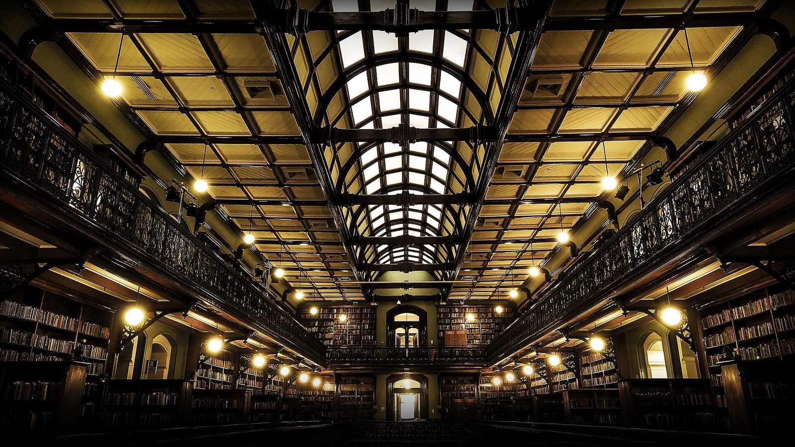 Library with tall shelves of books